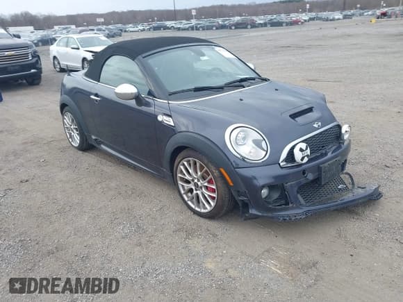 ✅ 2014 MINI Roadster • VIN: WMWSY9C51ET432712 • Lot: 41721689. Listed on IAAI with 55,163 mi. Free auction sales archive from the USA and detailed vehicle history report at DreamBid. Image 1.