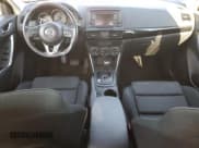 ✅ 2014 Mazda CX-5 Touring • VIN: JM3KE4CY9E0351717 • Lot: 92629565. Wystawiony na Copart z przebiegiem 94 979 mil. Bezpłatny archiwum sprzedaży aukcyjnych z USA i szczegółowy raport historii pojazdu na DreamBid. Zdjęcie 8.