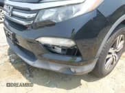 ✅ 2017 Honda Pilot EX-L • VIN: 5FNYF5H50HB018073 • Lot: 42417778. Listed on IAAI with 60,784 mi. Free auction sales archive from the USA and detailed vehicle history report at DreamBid. Image 17.