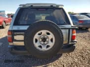 ✅ 1996 Nissan Pathfinder XE • VIN: JN8AR05Y2TW038604 • Lot: 72395444. Listed on Copart with 146,358 mi. Free auction sales archive from the USA and detailed vehicle history report at DreamBid. Image 6.