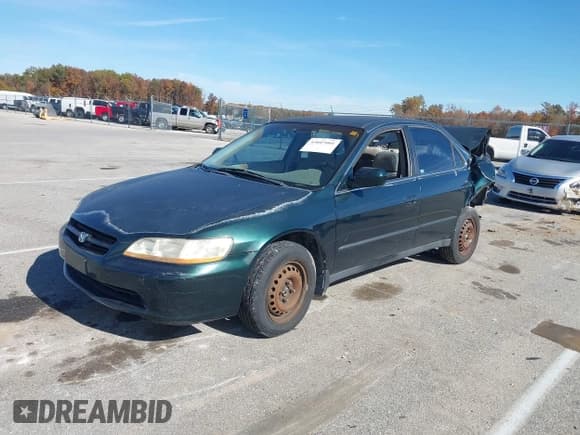 ✅ 1999 Honda Accord LX • VIN: 1HGCG5646XA128040 • Лот: 43607001. Опубликован ранее на IAAI с пробегом Не указан. Бесплатный доступ к архиву аукционных продаж из США и подробный отчёт об истории автомобиля на DreamBid. Изображение 18.