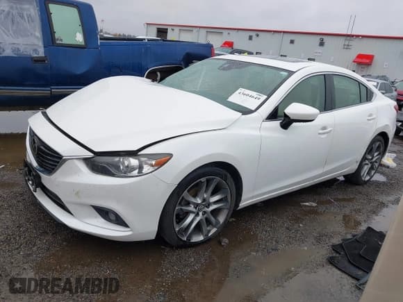 ✅ 2014 Mazda 6 i Grand Touring • VIN: JM1GJ1W67E1118643 • Lot: 43604649. Listed on IAAI with 147,515 mi. Free auction sales archive from the USA and detailed vehicle history report at DreamBid. Image 18.