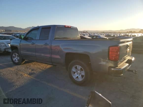 2015 Chevrolet Silverado 1500 LT z VIN 1GCRCREC4FZ262324, wystawiony jako Copart lot #84000115 z przebiegiem 129 765 mil mil oraz Szkoda całkowita • Salvage title. Historia ofert i sprzedaży dostępna na DreamBid. Obrazek 2.