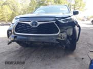 ✅ 2022 Toyota Highlander Hybrid XLE • VIN: 5TDGBRCH3NS561716 • Lot: 43162841. Listed on IAAI with 234,602 mi. Free auction sales archive from the USA and detailed vehicle history report at DreamBid. Image 6.