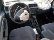 ✅ 1996 Suzuki Sidekick • VIN: JS3TD21V2T4103586 • Lot: 83492154. Wystawiony na Copart z przebiegiem 98 298 mil. Bezpłatny archiwum sprzedaży aukcyjnych z USA i szczegółowy raport historii pojazdu na DreamBid. Zdjęcie 8.