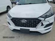 ✅ 2021 Hyundai Tucson SE • VIN: KM8J2CA49MU361738 • Lot: 59797465. Listed on Copart with 55,343 mi. Free auction sales archive from the USA and detailed vehicle history report at DreamBid. Image 14.