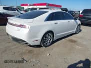 ✅ 2013 Lincoln MKZ Hybrid • VIN: 3LN6L2LU5DR828607 • Lot: 40937392. Wystawiony na IAAI z przebiegiem 144 940 mil. Bezpłatny archiwum sprzedaży aukcyjnych z USA i szczegółowy raport historii pojazdu na DreamBid. Zdjęcie 4.