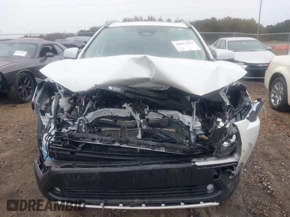 ✅ 2023 Toyota Corolla Cross XLE • VIN: 7MUDAAAG5PV062216 • Lot: 40851564. Listed on IAAI with 21,120 mi. Free auction sales archive from the USA and detailed vehicle history report at DreamBid. Image 13.