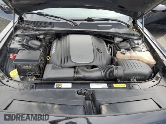 2014 Dodge Challenger R/T z VIN 2C3CDYBT1EH139648, wystawiony jako Copart lot #67593354 z przebiegiem 79 469 mil mil oraz Szkoda całkowita • Salvage title. Historia ofert i sprzedaży dostępna na DreamBid. Obrazek 12.