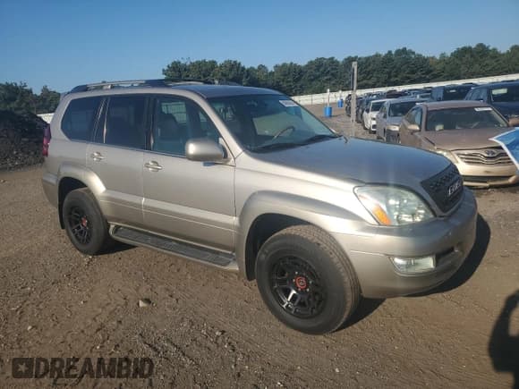 ✅ 2003 Lexus GX 470 • VIN: JTJBT20X030017679 • Лот: 80868435. Опубликован ранее на Copart с пробегом 307 152 миль. Бесплатный доступ к архиву аукционных продаж из США и подробный отчёт об истории автомобиля на DreamBid. Изображение 4.