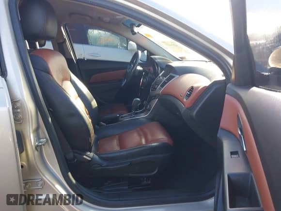 2014 Chevrolet Cruze 2LT with VIN 1G1PE5SBXE7257699, listed as a IAAI auction lot 43514227 with 131,115 mi miles and . Bid and sale history available at DreamBid. Image 5.