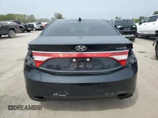 2014 Hyundai Azera Limited z VIN KMHFH4JGXEA424725, wystawiony jako Copart lot #71467274 z przebiegiem 39 689 mil mil oraz Szkoda całkowita • Salvage title. Historia ofert i sprzedaży dostępna na DreamBid. Obrazek 6.
