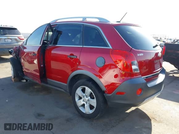 2015 Chevrolet Captiva Sport LS z VIN 3GNAL2EK1FS525367, wystawiony jako IAAI lot #42499277 z przebiegiem 151 208 mil mil oraz . Historia ofert i sprzedaży dostępna na DreamBid. Obrazek 3.