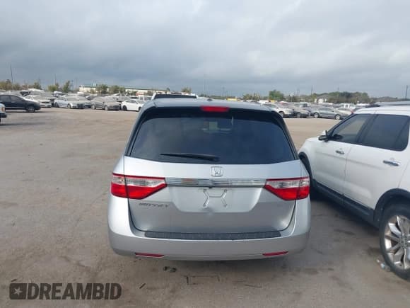 ✅ 2011 Honda Odyssey EX-L • VIN: 5FNRL5H62BB005368 • Lot: 43738477. Listed on IAAI with 207,719 mi. Free auction sales archive from the USA and detailed vehicle history report at DreamBid. Image 16.