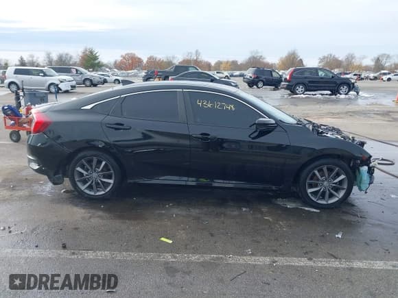 ✅ 2021 Honda Civic EX • VIN: 19XFC1F30ME000604 • Lot: 43612748. Listed on IAAI with 58,774 mi. Free auction sales archive from the USA and detailed vehicle history report at DreamBid. Image 14.