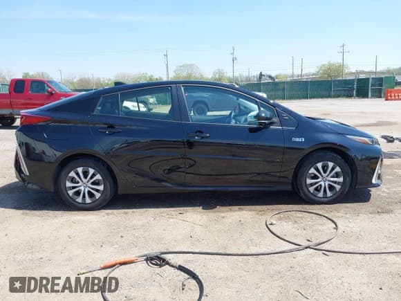 ✅ 2021 Toyota Prius LE • VIN: JTDKAMFP5M3187029 • Lot: 41985248. Wystawiony na IAAI z przebiegiem 16 419 mil. Bezpłatny archiwum sprzedaży aukcyjnych z USA i szczegółowy raport historii pojazdu na DreamBid. Zdjęcie 13.