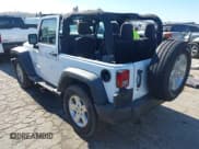 ✅ 2015 Jeep Wrangler Willys Wheeler • VIN: 1C4AJWAG1FL636417 • Lot: 43704796. Listed on IAAI with 81,914 mi. Free auction sales archive from the USA and detailed vehicle history report at DreamBid. Image 3.