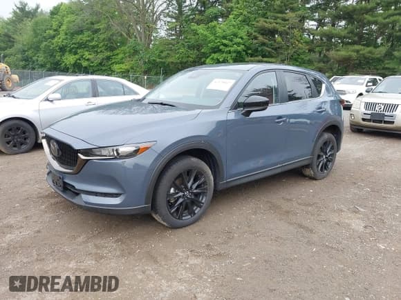 ✅ 2021 Mazda CX-5 Carbon Edition • VIN: JM3KFBCY1M0470863 • Lot: 42370027. Listed on IAAI with Not provided. Free auction sales archive from the USA and detailed vehicle history report at DreamBid. Image 17.