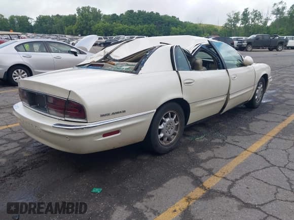 ✅ 2002 Buick Park Avenue • VIN: 1G4CW54K624133941 • Lot: 42580027. Wystawiony na IAAI z przebiegiem 142 144 mil. Bezpłatny archiwum sprzedaży aukcyjnych z USA i szczegółowy raport historii pojazdu na DreamBid. Zdjęcie 4.