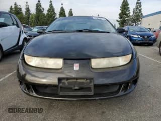 ✅ 1997 Saturn SC • VIN: 1G8ZF1286VZ350275 • Лот: 83010514. Опубликован ранее на Copart с пробегом 143 241 миль. Бесплатный доступ к архиву аукционных продаж из США и подробный отчёт об истории автомобиля на DreamBid. Изображение 5.