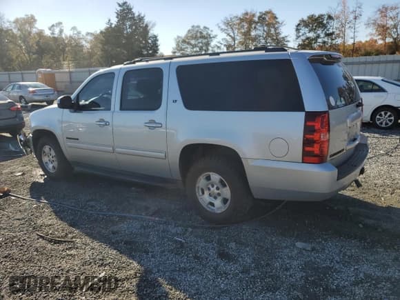✅ 2014 Chevrolet Suburban LT • VIN: 1GNSCJE05ER196090 • Lot: 90521905. Listed on Copart with 221,298 mi. Free auction sales archive from the USA and detailed vehicle history report at DreamBid. Image 2.