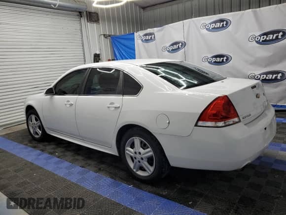 2014 Chevrolet Impala Police Police with VIN 2G1WD5E39E1183627, listed as a Copart auction lot 63675305 with 116,935 mi miles and Clean title. Bid and sale history available at DreamBid. Image 2.