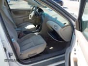 ✅ 2002 Oldsmobile Alero GL1 • VIN: 1G3NL52F72C280657 • Lot: 42641037. Wystawiony na IAAI z przebiegiem 94 691 mil. Bezpłatny archiwum sprzedaży aukcyjnych z USA i szczegółowy raport historii pojazdu na DreamBid. Zdjęcie 5.