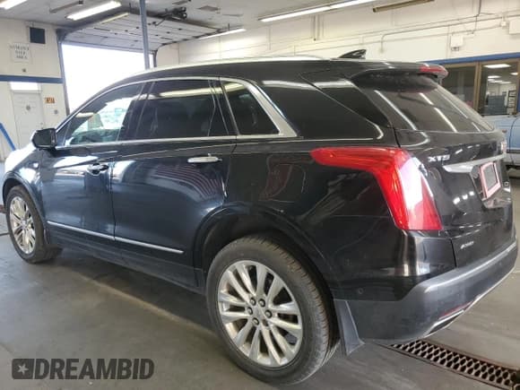 ✅ 2017 Cadillac XT5 Platinum AWD • VIN: 1GYKNFRSXHZ235640 • Lot: 80913815. Listed on Copart with 92,393 mi. Free auction sales archive from the USA and detailed vehicle history report at DreamBid. Image 2.