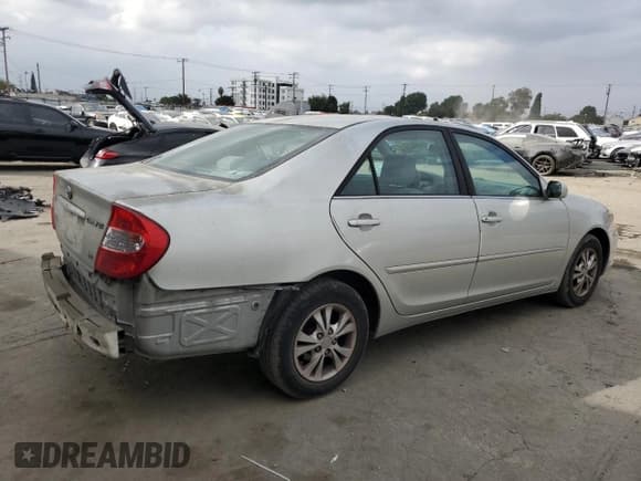 ✅ 2004 Toyota Camry LE • VIN: 4T1BF32K54U064388 • Lot: 90757985. Wystawiony na Copart z przebiegiem 140 869 mil. Bezpłatny archiwum sprzedaży aukcyjnych z USA i szczegółowy raport historii pojazdu na DreamBid. Zdjęcie 3.