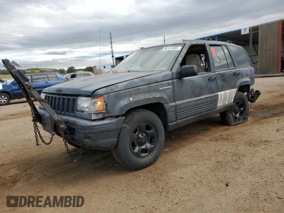 ✅ 1994 Jeep Grand Cherokee Laredo • VIN: 1J4GZ58S5RC351922 • Lot: 86131305. Listed on Copart with 200,941 mi. Free auction sales archive from the USA and detailed vehicle history report at DreamBid. Image 1.