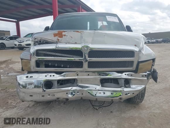 ✅ 1999 Dodge RAM • VIN: 3B7KC23W9XG138735 • Lot: 42829718. Listed on IAAI with 235,496 mi. Free auction sales archive from the USA and detailed vehicle history report at DreamBid. Image 6.