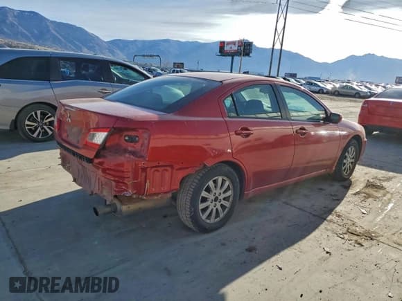 ✅ 2012 Mitsubishi Galant FE • VIN: 4A32B2FF0CE007786 • Lot: 94418825. Listed on Copart with 165,136 mi. Free auction sales archive from the USA and detailed vehicle history report at DreamBid. Image 3.