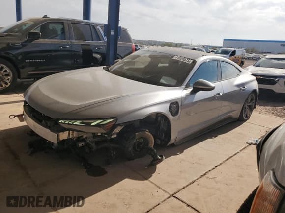 ✅ 2022 Audi e-tron GT Prestige • VIN: WAUDJBFW0N7003885 • Лот: 41626575. Опубликован ранее на Copart с пробегом 21 343 миль. Бесплатный доступ к архиву аукционных продаж из США и подробный отчёт об истории автомобиля на DreamBid. Изображение 1.