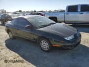 ✅ 1997 Saturn SC • VIN: 1G8ZF1286VZ266912 • Лот: 46953875. Опубликован ранее на Copart с пробегом 149 017 миль. Бесплатный доступ к архиву аукционных продаж из США и подробный отчёт об истории автомобиля на DreamBid. Изображение 4.