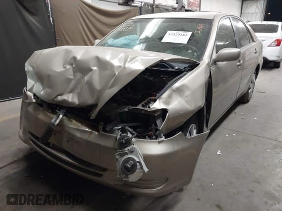 ✅ 2002 Toyota Camry LE • VIN: 4T1BE32K12U623807 • Lot: 43529281. Listed on IAAI with 184,368 mi. Free auction sales archive from the USA and detailed vehicle history report at DreamBid. Image 2.