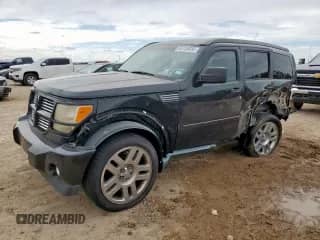 2011 Dodge Nitro Heat z VIN 1D4PT4GX2BW504875, wystawiony jako Copart lot #63136035 z przebiegiem 184 721 mil mil oraz Szkoda całkowita • Salvage title. Historia ofert i sprzedaży dostępna na DreamBid. Obrazek 1.