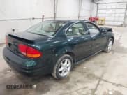 ✅ 2001 Oldsmobile Alero GL2 • VIN: 1G3NL52T91C252959 • Lot: 41973703. Listed on IAAI with 77,619 mi. Free auction sales archive from the USA and detailed vehicle history report at DreamBid. Image 4.