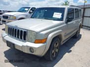 ✅ 2007 Jeep Commander Sport • VIN: 1J8HH48K47C699904 • Lot: 42509665. Listed on IAAI with 198,539 mi. Free auction sales archive from the USA and detailed vehicle history report at DreamBid. Image 2.