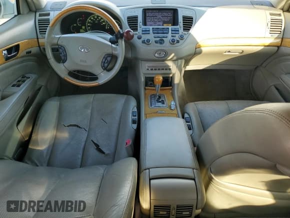 ✅ 2003 Infiniti Q45 • VIN: JNKBF01AX3M102013 • Лот: 86064635. Опубликован ранее на Copart с пробегом 140 637 миль. Бесплатный доступ к архиву аукционных продаж из США и подробный отчёт об истории автомобиля на DreamBid. Изображение 8.