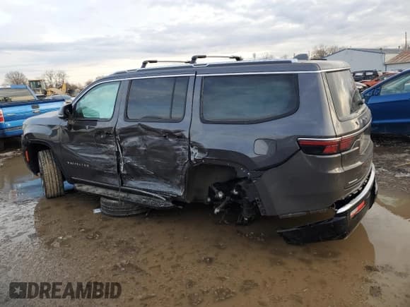 ✅ 2023 Jeep Wagoneer Series II Carbide • VIN: 1C4SJVBP2PS585000 • Lot: 86178334. Listed on Copart with 14,028 mi. Free auction sales archive from the USA and detailed vehicle history report at DreamBid. Image 2.