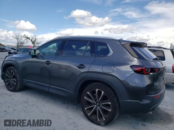 ✅ 2023 Mazda CX-50 S Premium Plus • VIN: 7MMVABEM8PN136223 • Lot: 71307085. Listed on Copart with 22,401 mi. Free auction sales archive from the USA and detailed vehicle history report at DreamBid. Image 2.