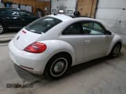 ✅ 2013 Volkswagen Beetle 2.5L • VIN: 3VWHX7AT2DM634149 • Lot: 59927975. Listed on Copart with Not provided. Free auction sales archive from the USA and detailed vehicle history report at DreamBid. Image 3.