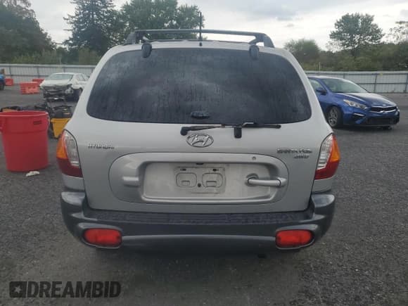 ✅ 2004 Hyundai Santa Fe GLS • VIN: KM8SC73D24U770606 • Lot: 81580075. Listed on Copart with 199,227 mi. Free auction sales archive from the USA and detailed vehicle history report at DreamBid. Image 6.