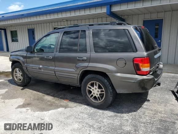 2004 Jeep Grand Cherokee Laredo с VIN 1J4GX48S54C381804, выставлен на аукционе Copart как лот 84025475 с пробегом 130 694 миль миль и Списание • Salvage title. История ставок и продаж доступна на DreamBid. Изображение 2.