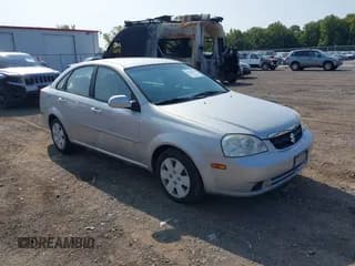 ✅ 2006 Suzuki Forenza • VIN: KL5JD56ZX6K401022 • Lot: 43156165. Wystawiony na IAAI z przebiegiem 24 504 mil. Bezpłatny archiwum sprzedaży aukcyjnych z USA i szczegółowy raport historii pojazdu na DreamBid. Zdjęcie 1.