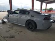✅ 2022 Dodge Charger GT • VIN: 2C3CDXHG2NH104248 • Lot: 70005275. Wystawiony na Copart z przebiegiem Nie podano. Bezpłatny archiwum sprzedaży aukcyjnych z USA i szczegółowy raport historii pojazdu na DreamBid. Zdjęcie 2.