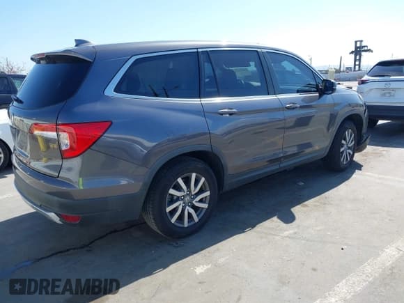 ✅ 2019 Honda Pilot EX-L • VIN: 5FNYF5H5XKB025457 • Lot: 42153274. Listed on IAAI with 71,956 mi. Free auction sales archive from the USA and detailed vehicle history report at DreamBid. Image 4.