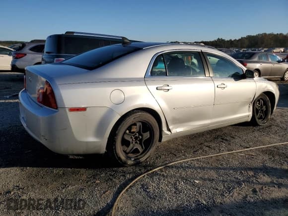 ✅ 2012 Chevrolet Malibu 1LS • VIN: 1G1ZB5E09CF357419 • Lot: 75650164. Listed on Copart with 150,496 mi. Free auction sales archive from the USA and detailed vehicle history report at DreamBid. Image 3.