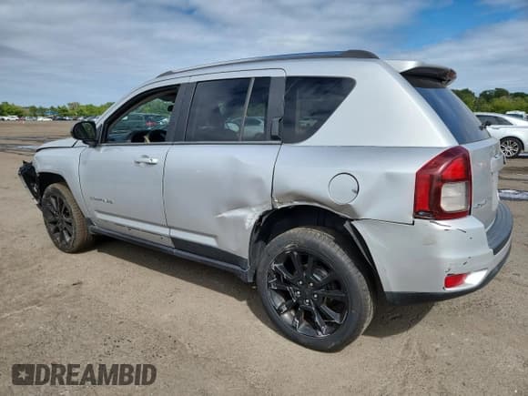 ✅ 2014 Jeep Compass Sport • VIN: 1C4NJDBB2ED506115 • Lot: 80167395. Listed on Copart with 104,217 mi. Free auction sales archive from the USA and detailed vehicle history report at DreamBid. Image 2.