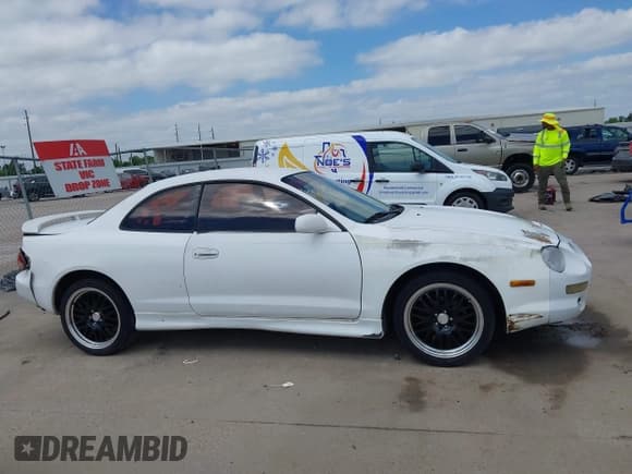 ✅ 1996 Toyota Celica • VIN: JT2CB02T3T0060866 • Lot: 42024588. Wystawiony na IAAI z przebiegiem 233 760 mil. Bezpłatny archiwum sprzedaży aukcyjnych z USA i szczegółowy raport historii pojazdu na DreamBid. Zdjęcie 13.